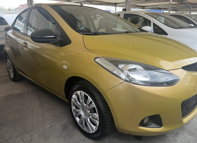 
								MAZDA 2 pieno									